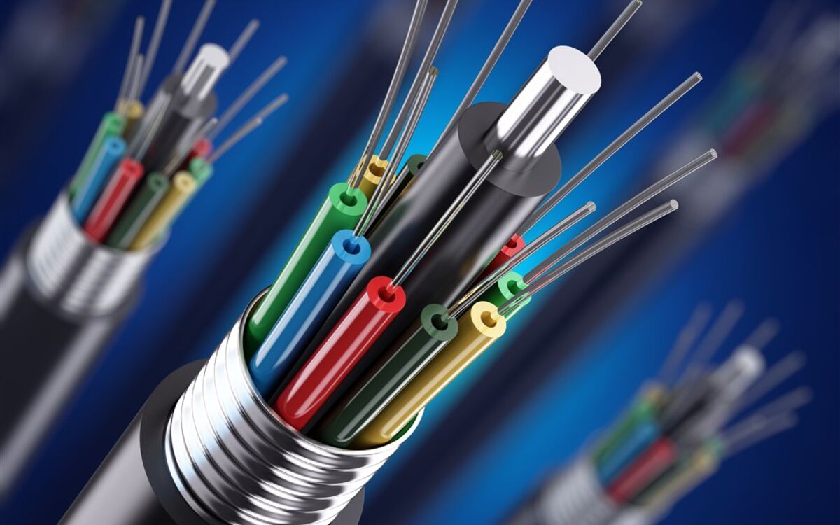 Reels of fiber optic cable stacked in the factory